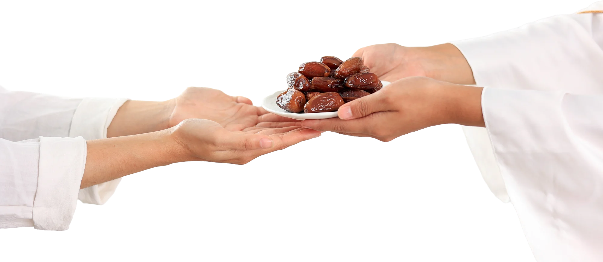 Hands offering a plate of fresh dates